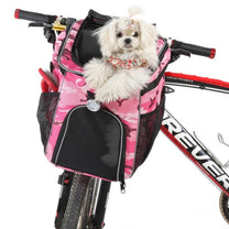 Foldable 2-in-1 pet bike bag and backpack in pink with a dog inside