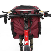 Foldable 2-in-1 pet bike bag and backpack in red on the bicycle, front view