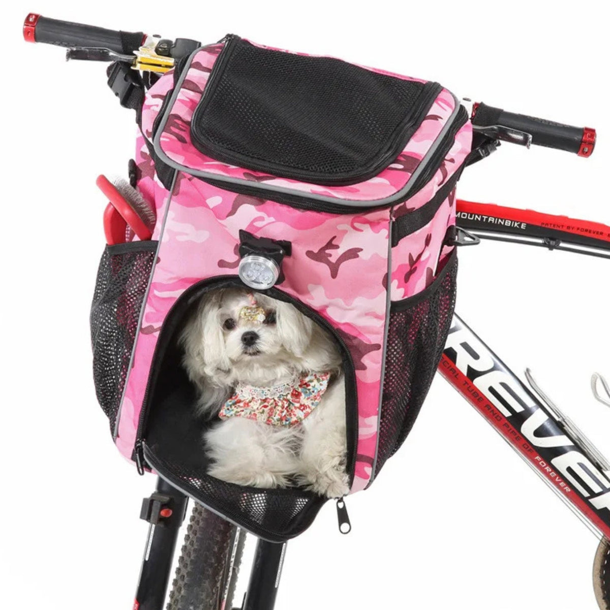 Foldable 2-in-1 pet bike bag and backpack in pink with a dog inside, angled view