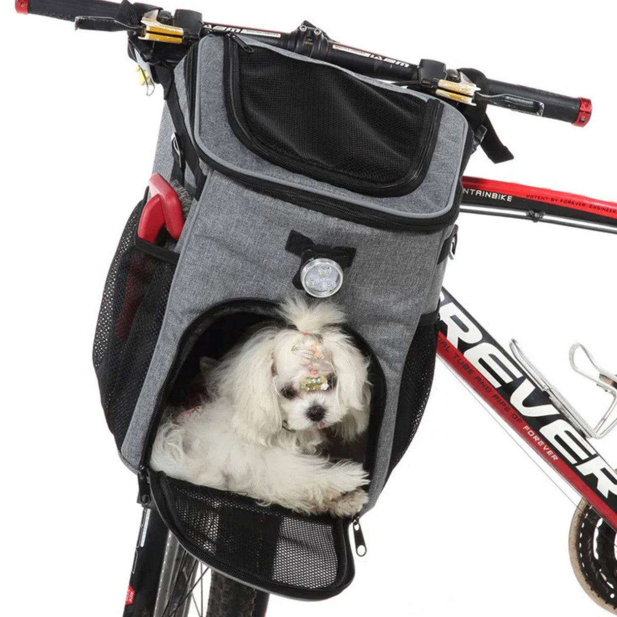 Foldable 2-in-1 pet bike bag and backpack in grey with a dog inside, angled view