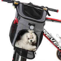 Foldable 2-in-1 pet bike bag and backpack in grey with a dog inside, angled view
