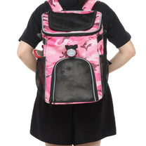 Foldable 2-in-1 pet bike bag and backpack in pink, worn by a person
