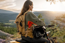 Person standing with the 79BIKE Falcon Pro electric dirt bike