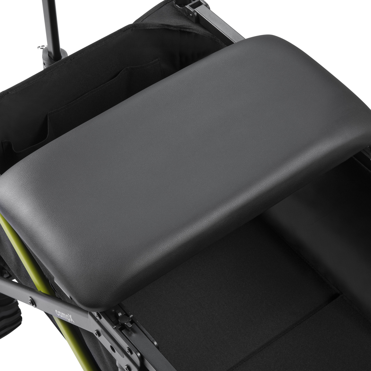 Close-up of a black padded surface on top of the DYU CampX and the fabric basket below