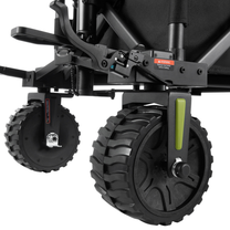 DYU CampX, close-up of two chunky-tread wheels, lever and warning label on the black chassis