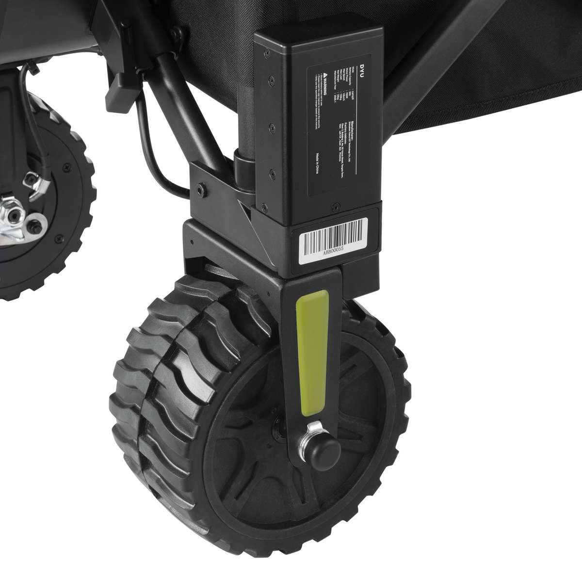 DYU CampX, close-up of wheel with black box with label and barcode and green detail on the wheel mount