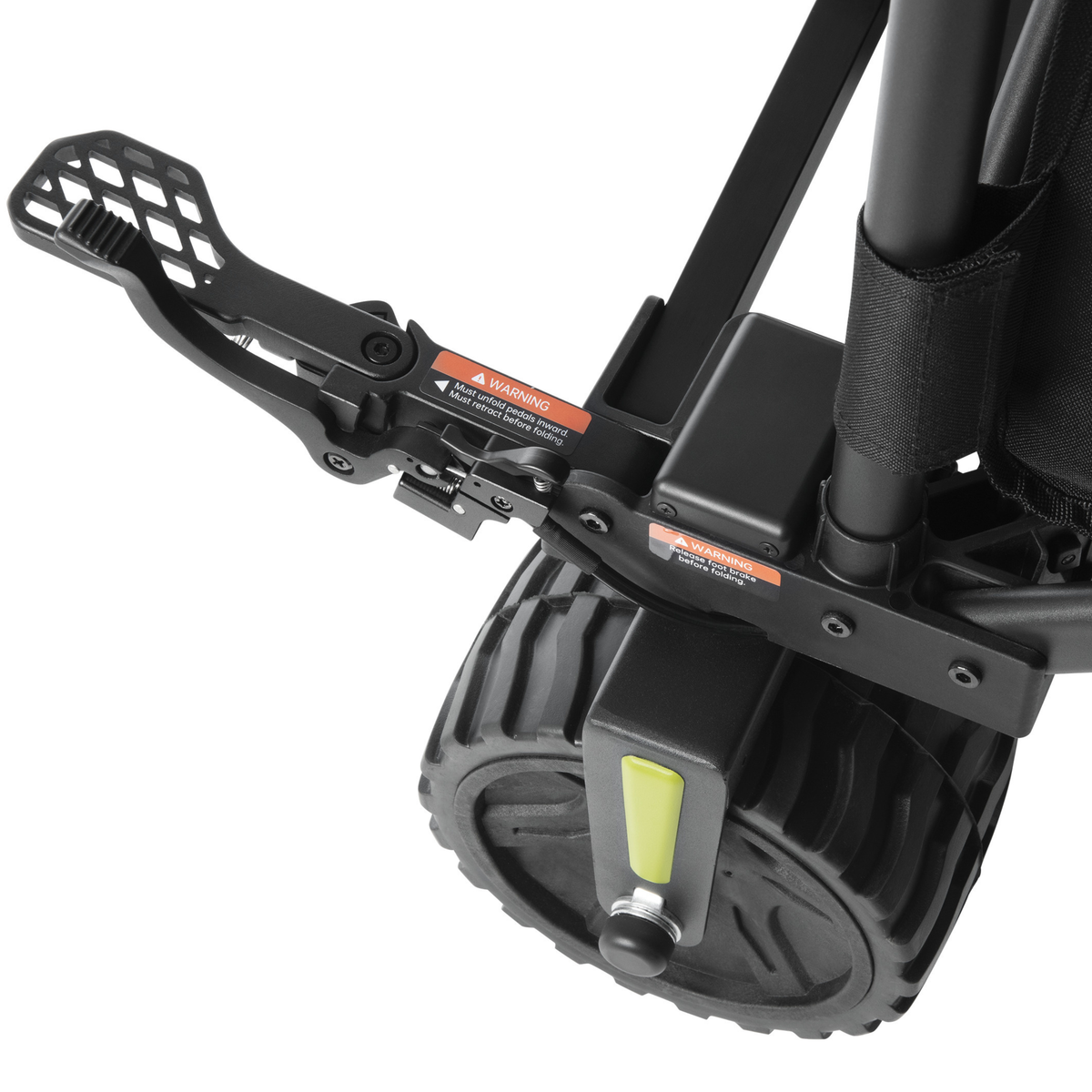 DYU CampX, close-up of folding pedal, warning labels, black box and chunky-tread wheel