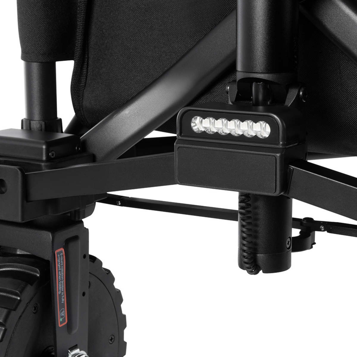 Close-up of the DYU CampX frame with a multi-LED light unit and a wheel