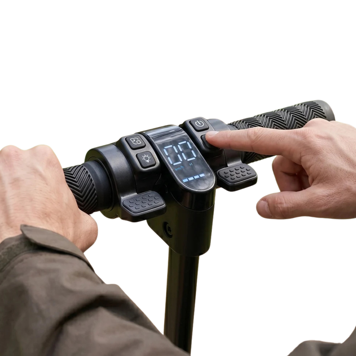 Close-up of handlebar with display and buttons, with a finger pressing a button