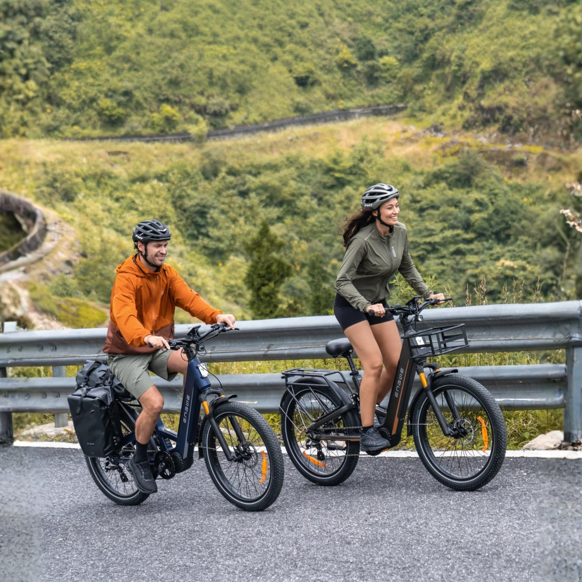 Two riders with the ENGWE E26 3.0 PRO fat-tyre e-bike on a road