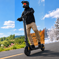 Man riding the HX D01 electric scooter on a road