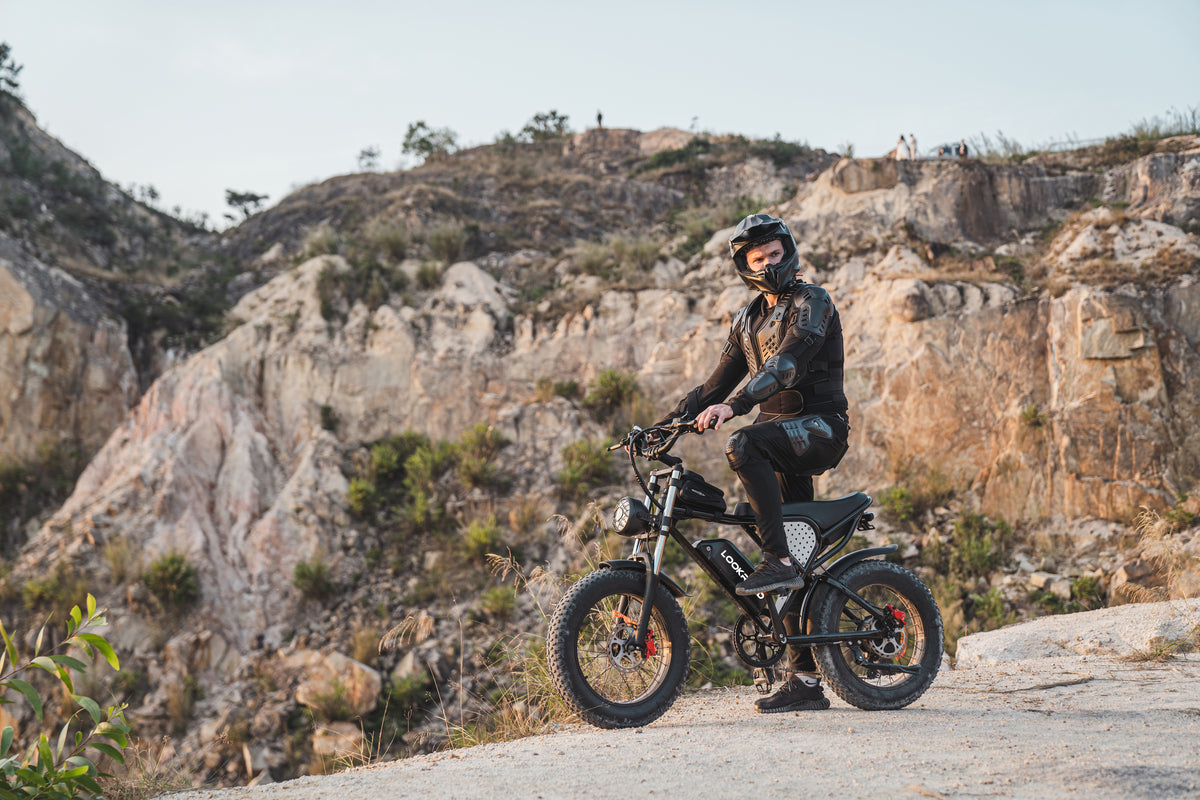 Rider taking the LOOKROAD L20 fat-tyre e-bike off-road