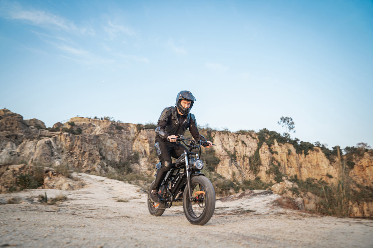 Rider taking the LOOKROAD L20 fat-tyre e-bike off-road