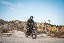Rider taking the LOOKROAD L20 fat-tyre e-bike off-road