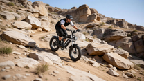 Person riding the LOOKROAD L20 fat-tyre e-bike on sandy ground