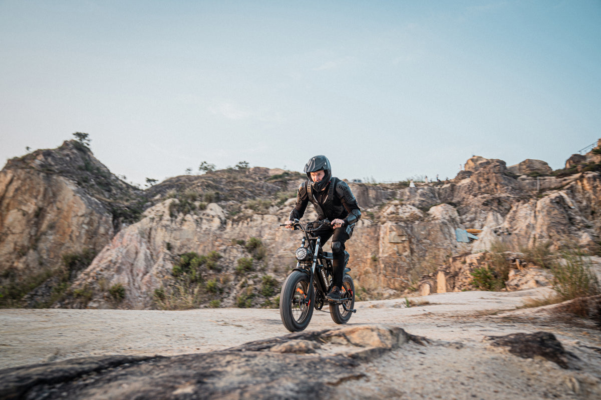 Rider taking the LOOKROAD L20 fat-tyre e-bike off-road