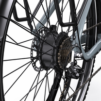 OneSport OT05 Max close-up of rear wheel hub with brake disc, cassette, chain and derailleur