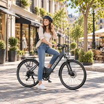 Woman wearing a helmet on a grey OneSport OT12 Pro on a cobblestone street