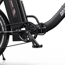 OneSport OT16 Pro close-up of crank area, pedal, battery and black frame hinge