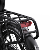 OneSport OT16 Pro, close-up of black rear rack, red rear light and rear mudguard over the rear wheel