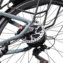 OneSport WT05 rear wheel hub with brake disc, caliper, rear rack and rear derailleur in close-up