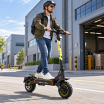Man wearing a helmet and sunglasses rides a Wheely - H7 on a road in front of an industrial building