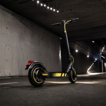Wheely J04 electric scooter, front three-quarter view indoors