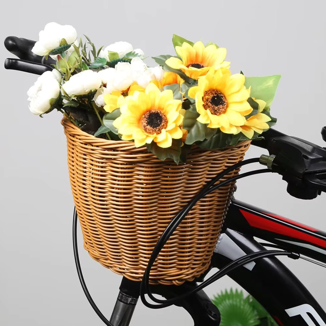 Bicycle basket Classic Edition with flowers on a bicycle