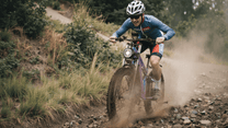 Rider taking the Duotts E26 fat-tyre e-bike off-road in the forest