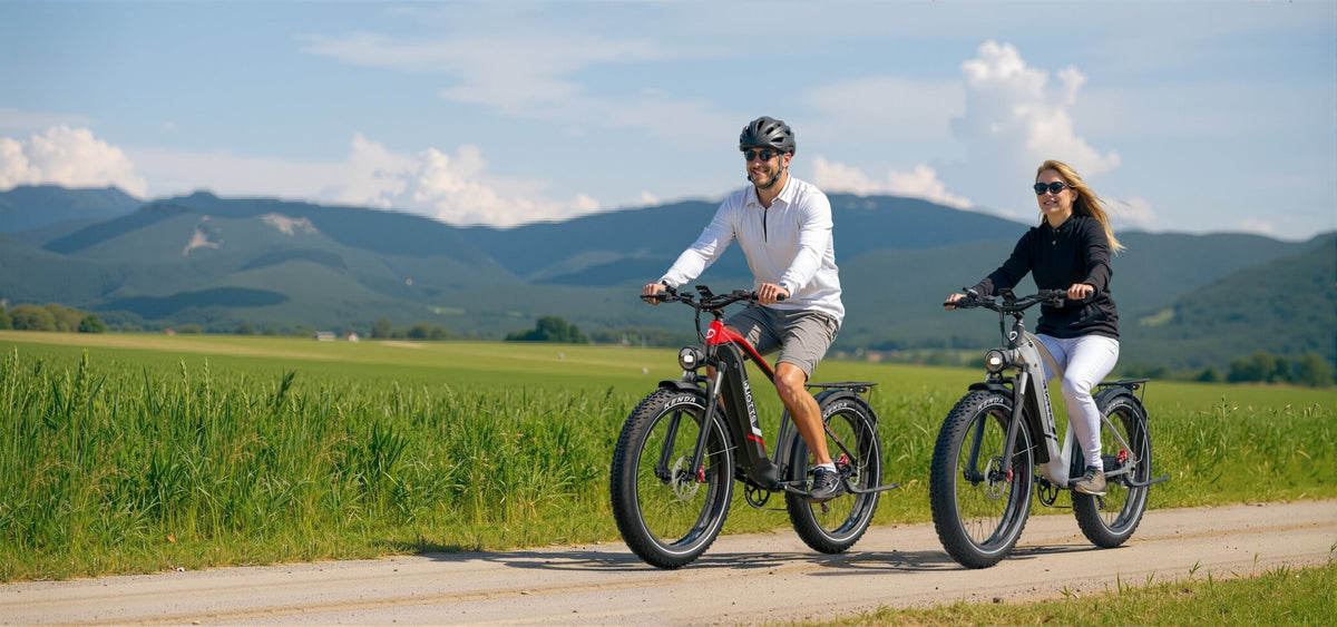Two riders with the Duotts F26 Lite fat-tyre e-bike on a footpath
