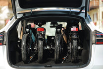 Folded DYU C2 folding e-bike in a car boot