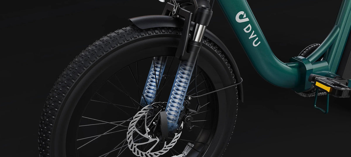 DYU C9 folding e-bike folded against a dark background