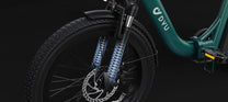 DYU C9 folding e-bike folded against a dark background