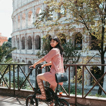 Woman riding the DYU D3S folding e-bike in the city