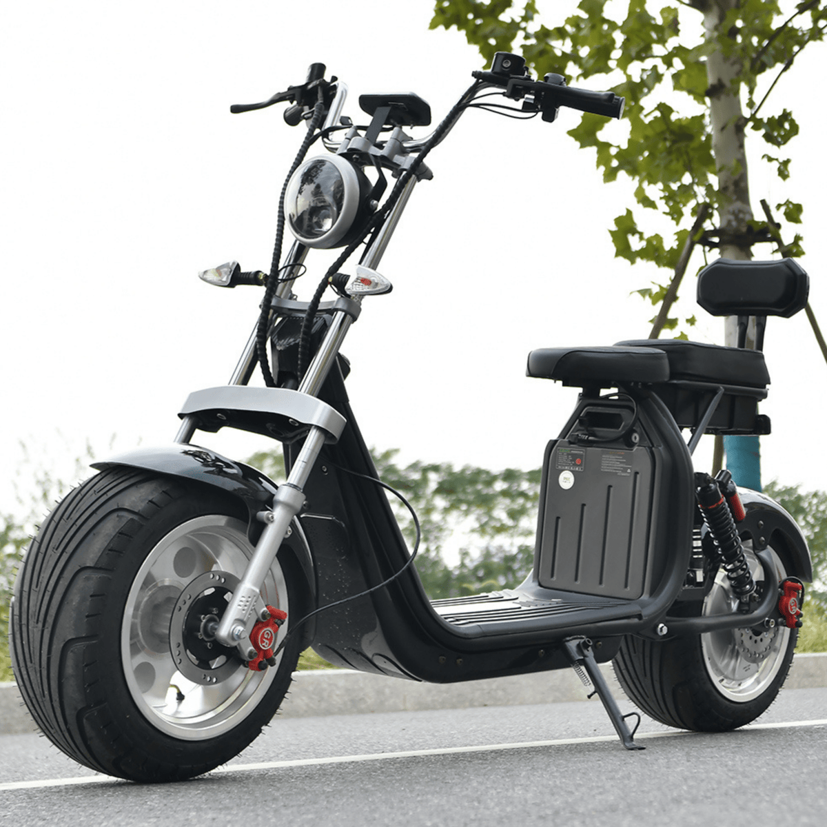 eHoodax X10 City Road electric scooter seen from the side on a road