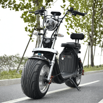eHoodax X10 City Road electric scooter seen from the front on a road
