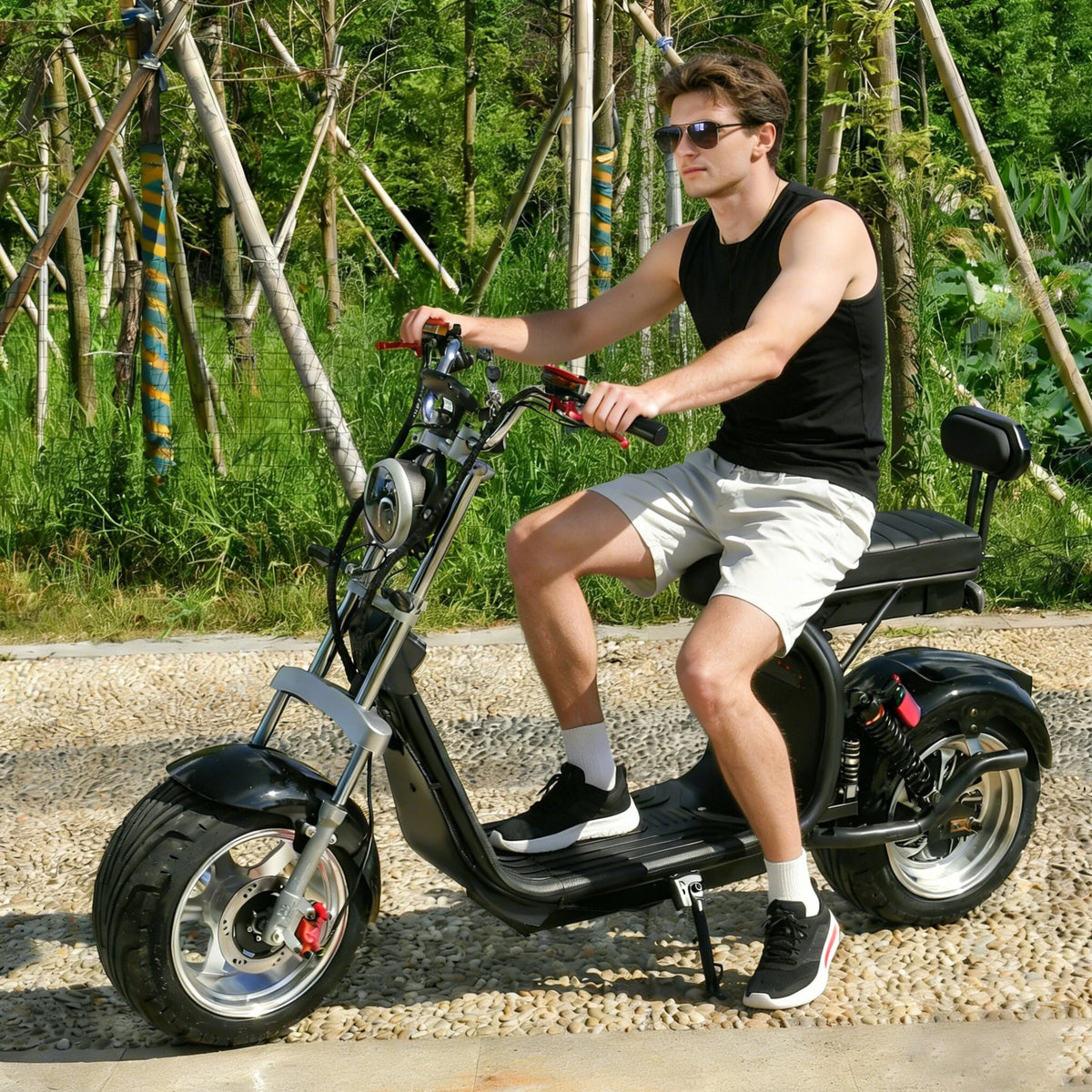 Man riding the eHoodax X10 City Road electric scooter