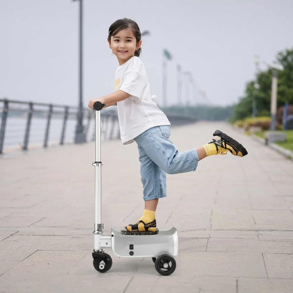 Child standing on the AeroDrive Edition electric ride-on suitcase outdoors