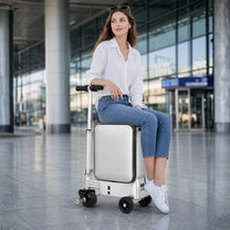 Person riding the AeroDrive Edition electric ride-on suitcase outdoors