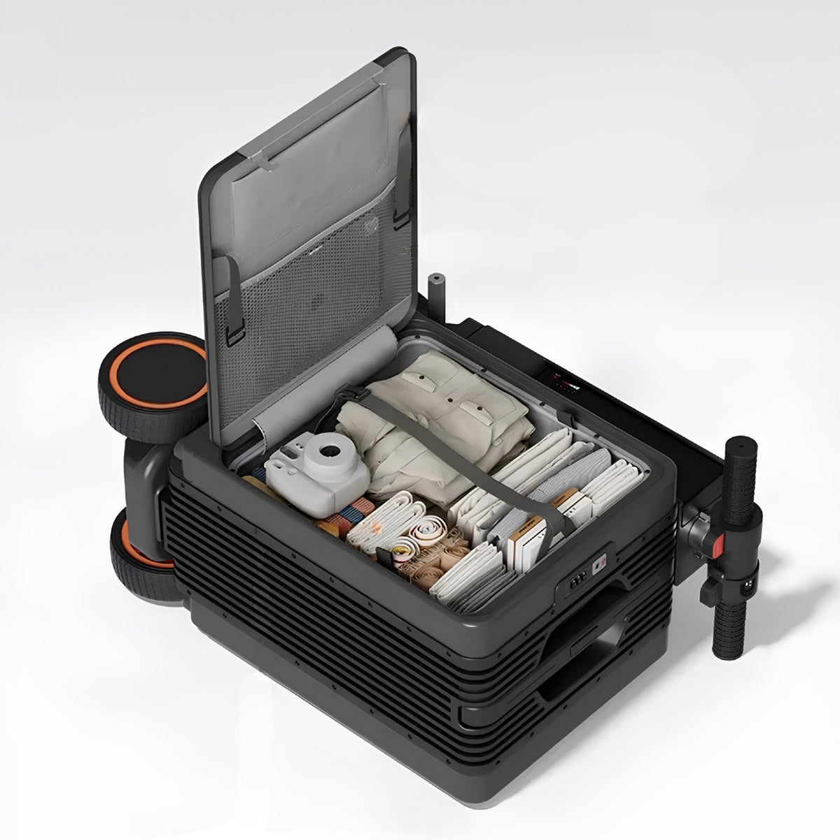Urban Move Edition electric ride-on suitcase in black, opened with packed contents