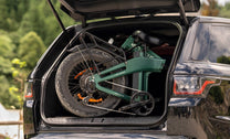 Folded ENGWE EP-2 3.0 Boost folding fat-tyre e-bike in a car boot