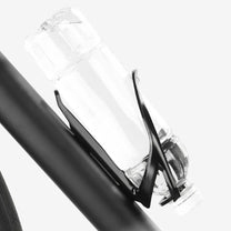 Bottle holder for e-bike frames in white fitted on a bicycle
