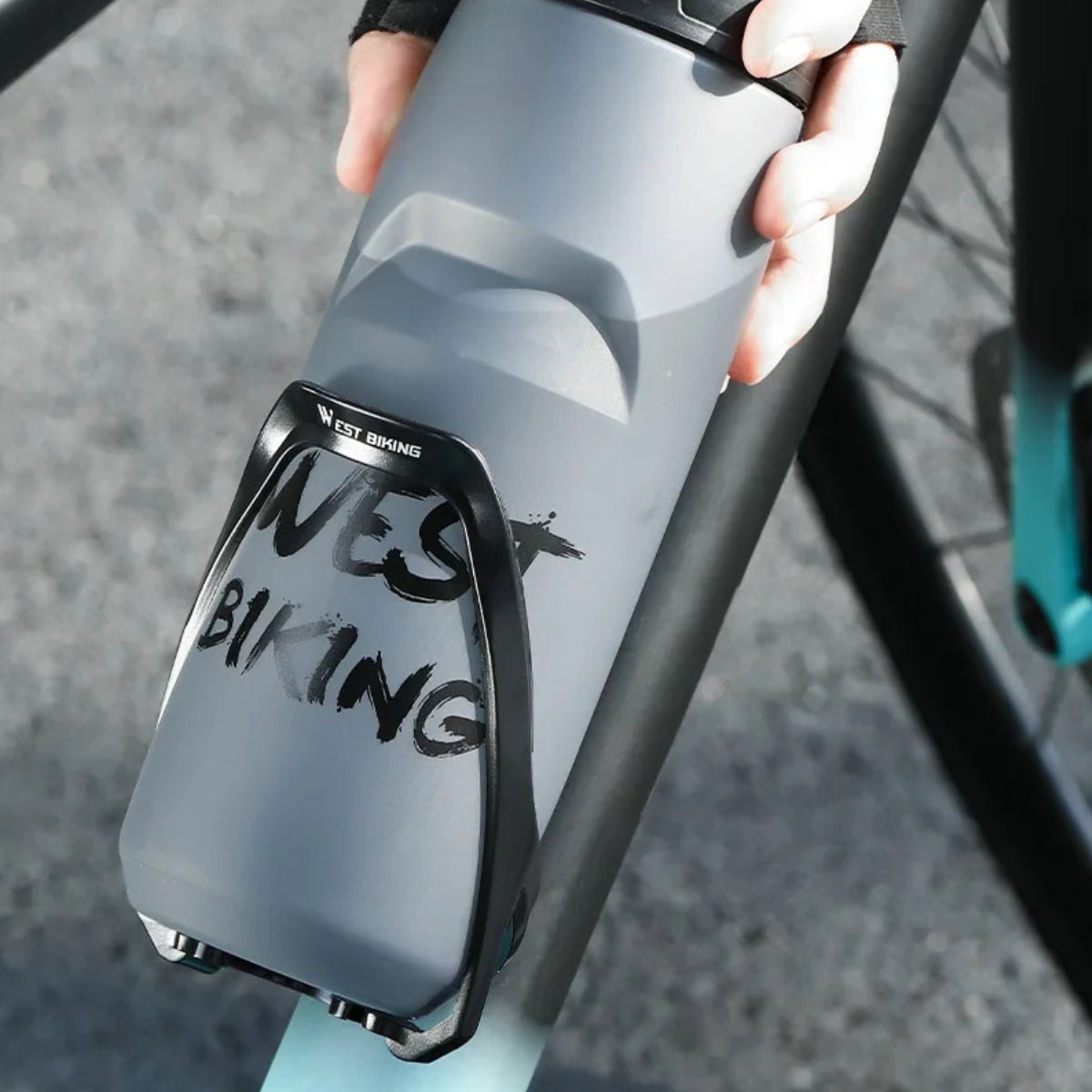 Bottle holder for e-bike frames in use