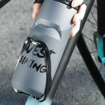 Bottle holder for e-bike frames in use