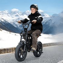Man riding the Hidoes B6 Mini fat-tyre e-bike in the snow