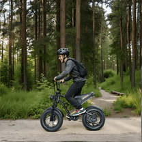 Man riding the Hidoes B6 Mini fat-tyre e-bike in the forest