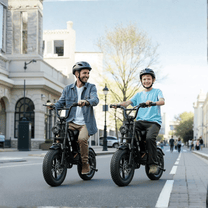 Two riders with the Hidoes B6 Mini fat-tyre e-bike in the city