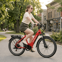 Woman riding the KOOLUX X2 e-bike in a park