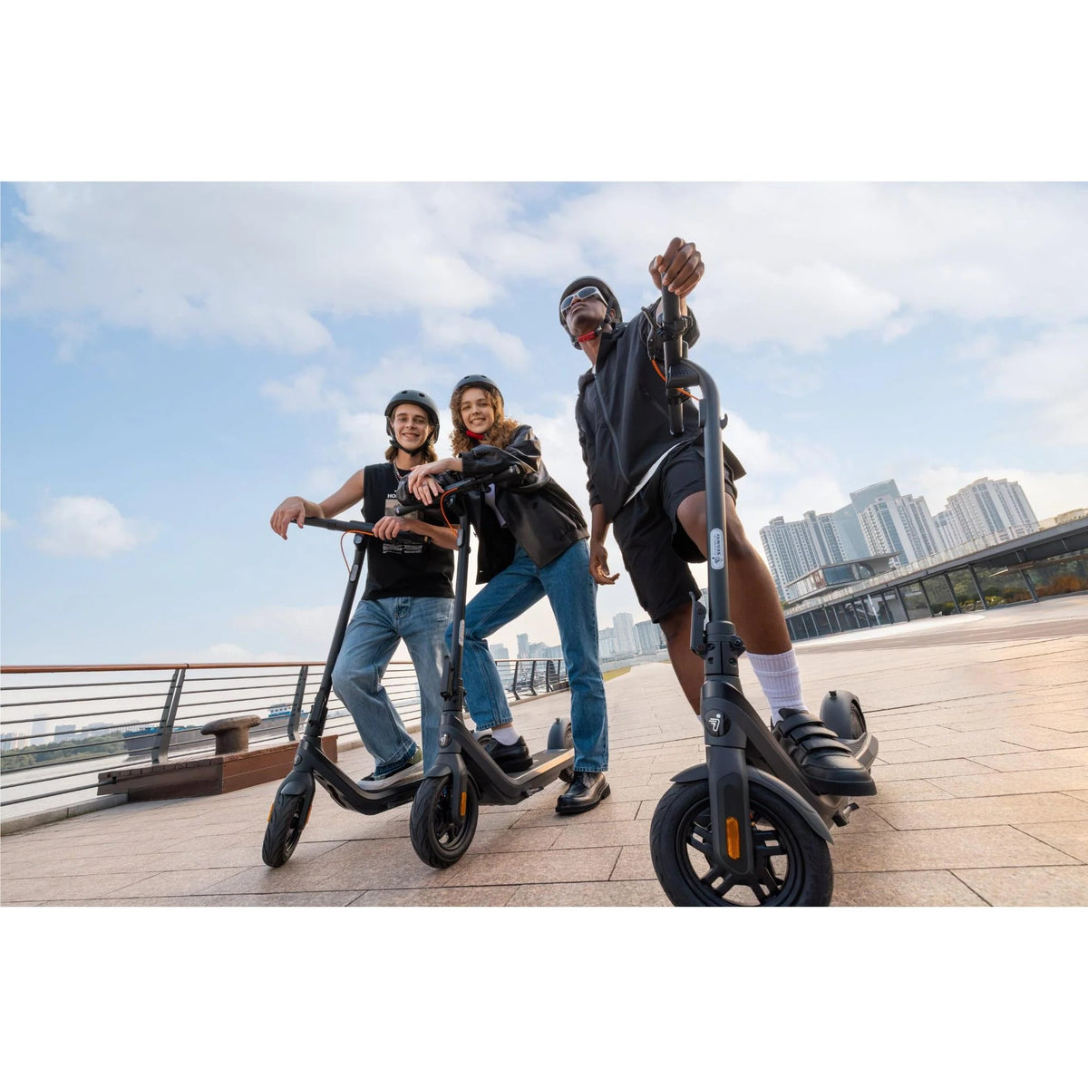 Person standing with the Segway Ninebot E2 Pro electric scooter