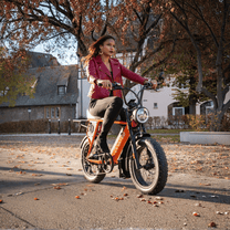 Woman riding the Onemile P40 Pro fat-tyre e-bike on a street